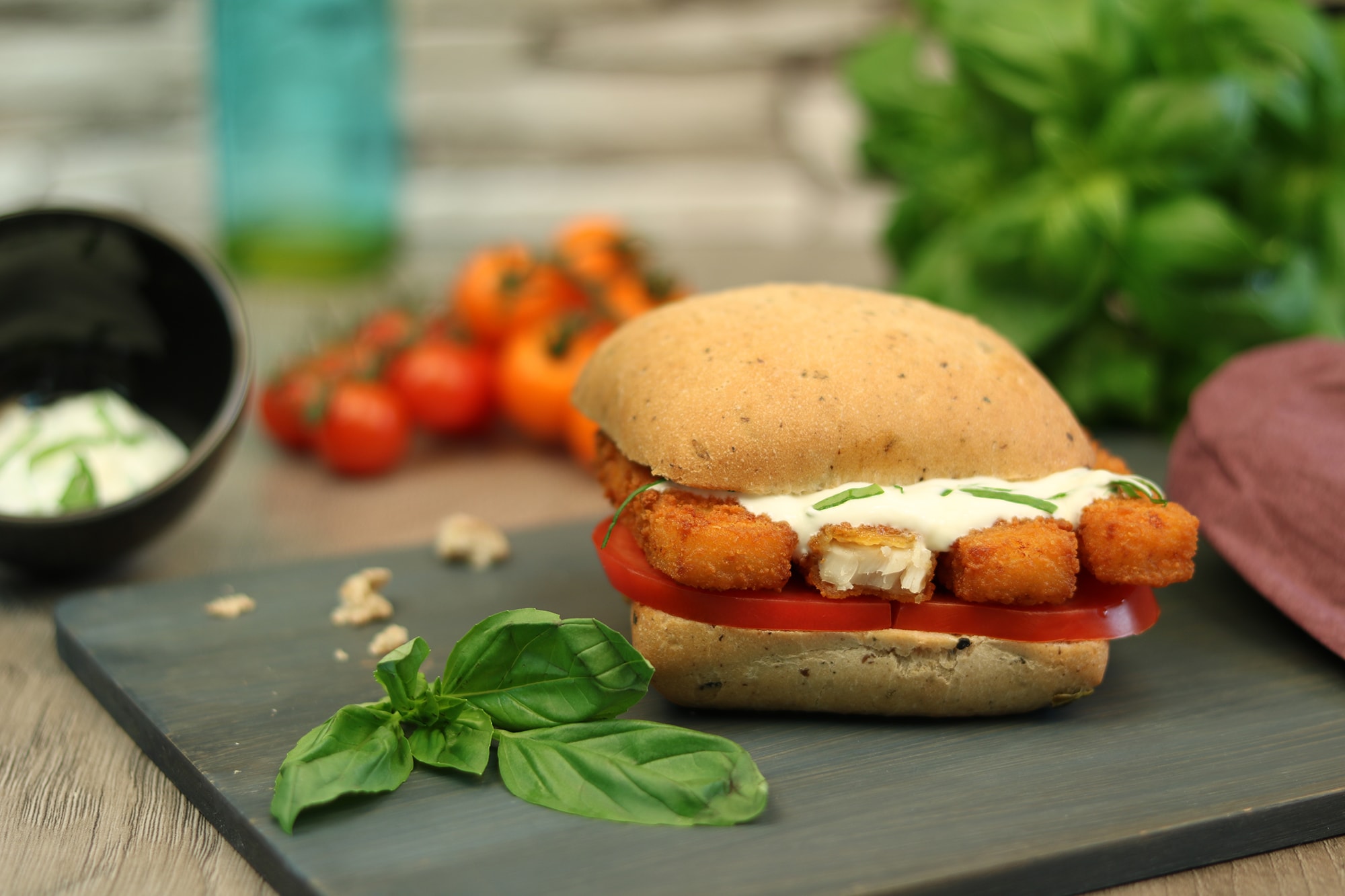 Fish fingers in a olive roll with a yogurt Basil dip