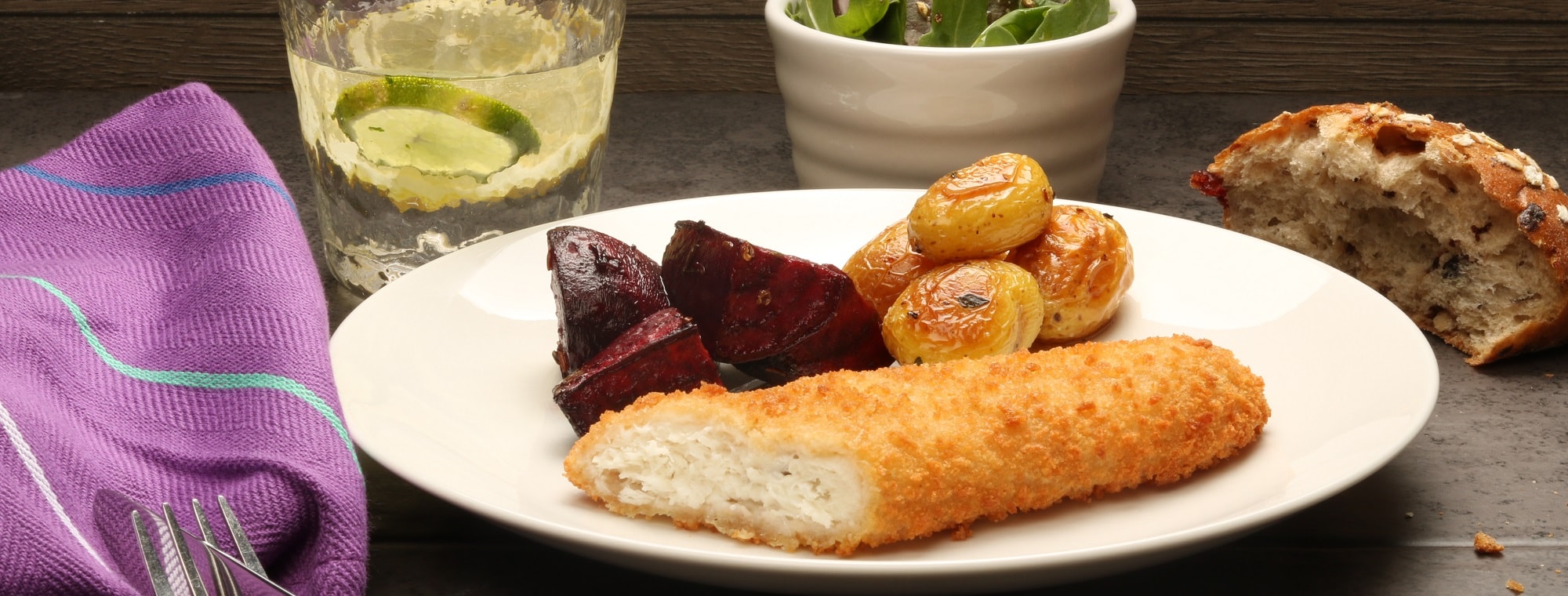 Breaded haddock with roasted baby potatoes  beetroot