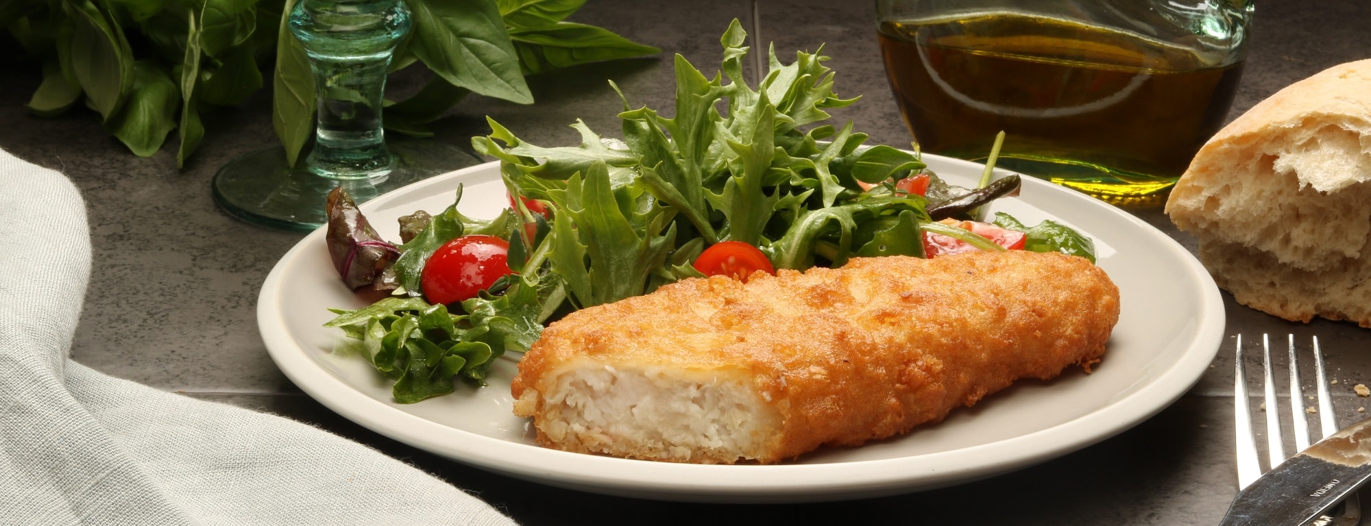 haddock fillets with green salad in mustard dressing