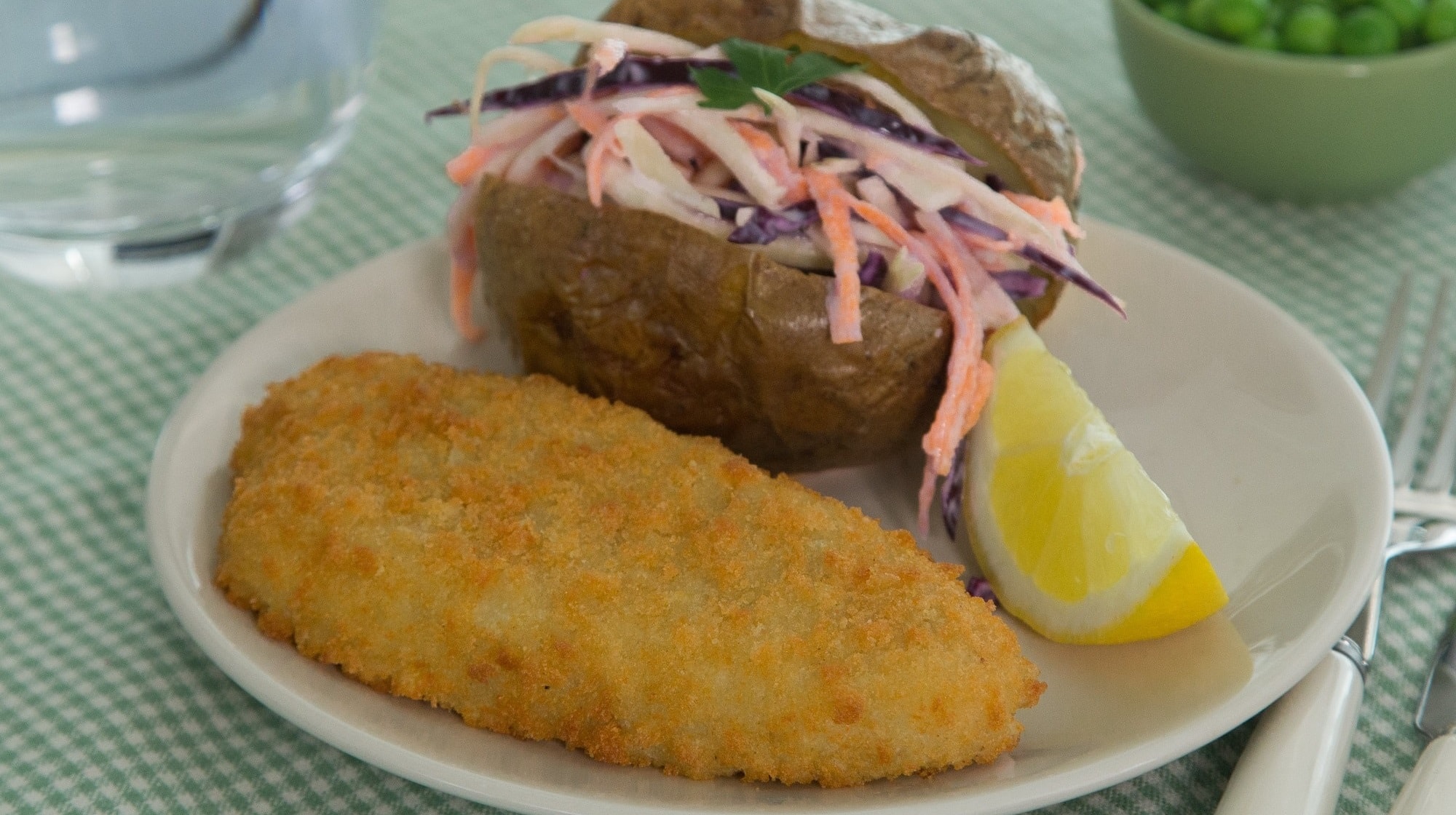 Breaded Cod Fillets with baked potato and healthy coleslaw
